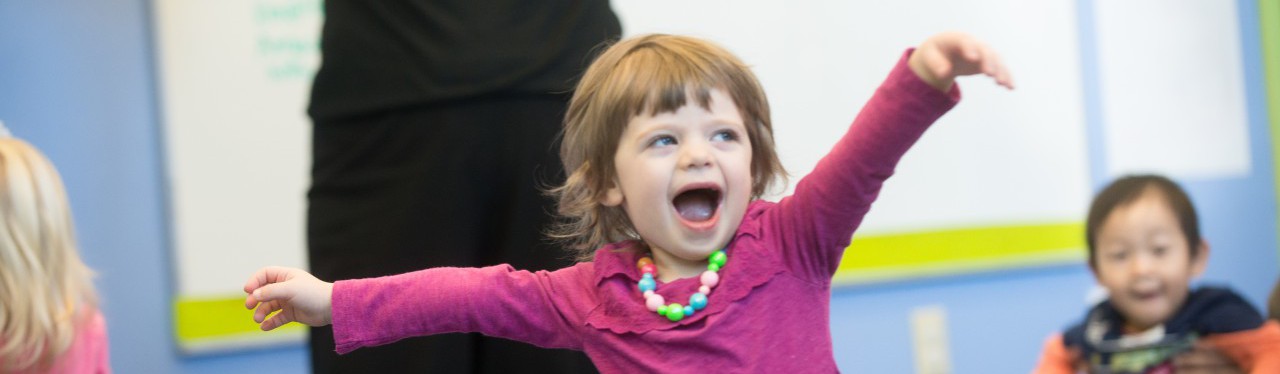 Child Dancing at Daycare Center